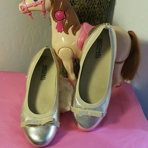 Girls Michael Kors gold slipper shoes